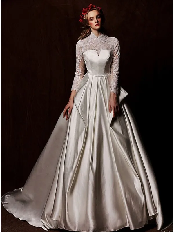 Abito da Sposa Invernale nuova collezione in raso e maniche di pizzo