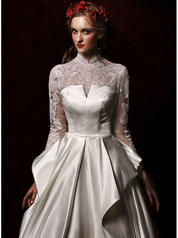 Abito da Sposa Invernale nuova collezione in raso e maniche di pizzo