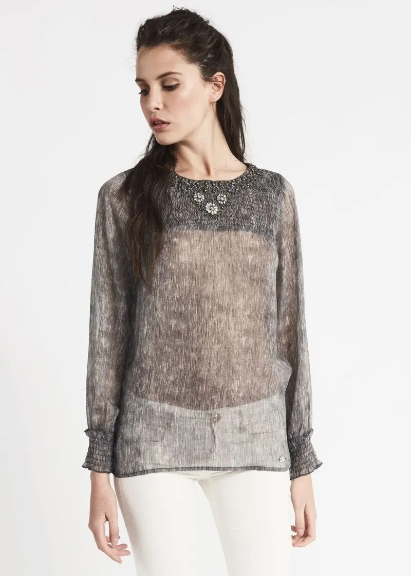 Blusa in chiffon con ricamo