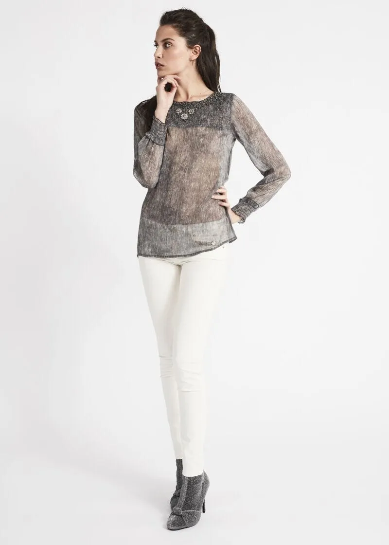 Blusa in chiffon con ricamo