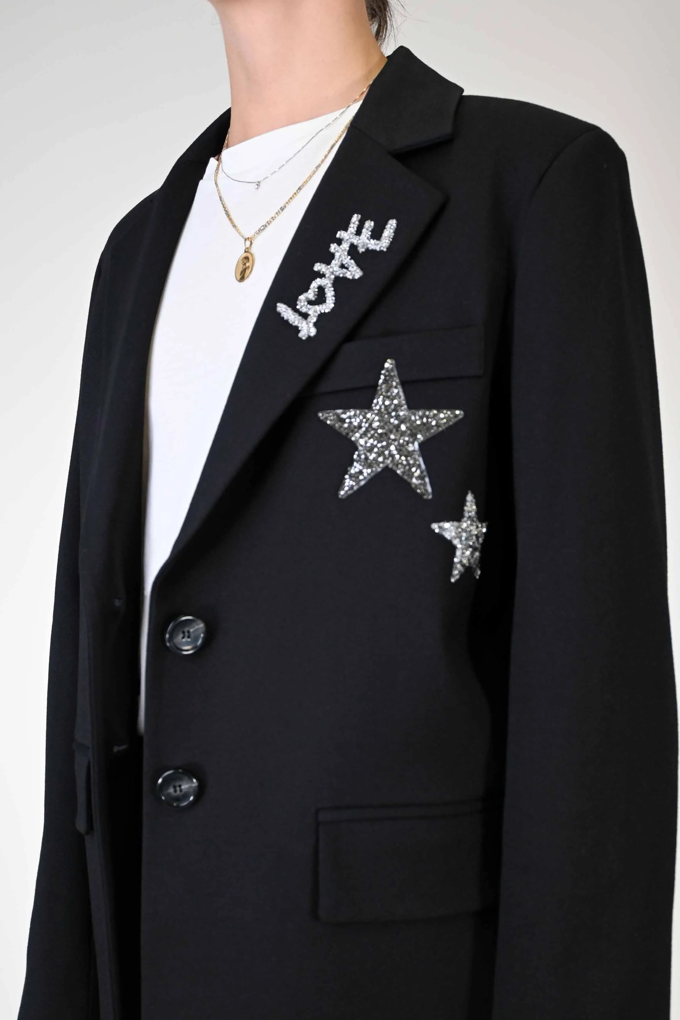 GIACCA OVER CON APPLICAZIONI STELLE/LOVE COLOR NERO