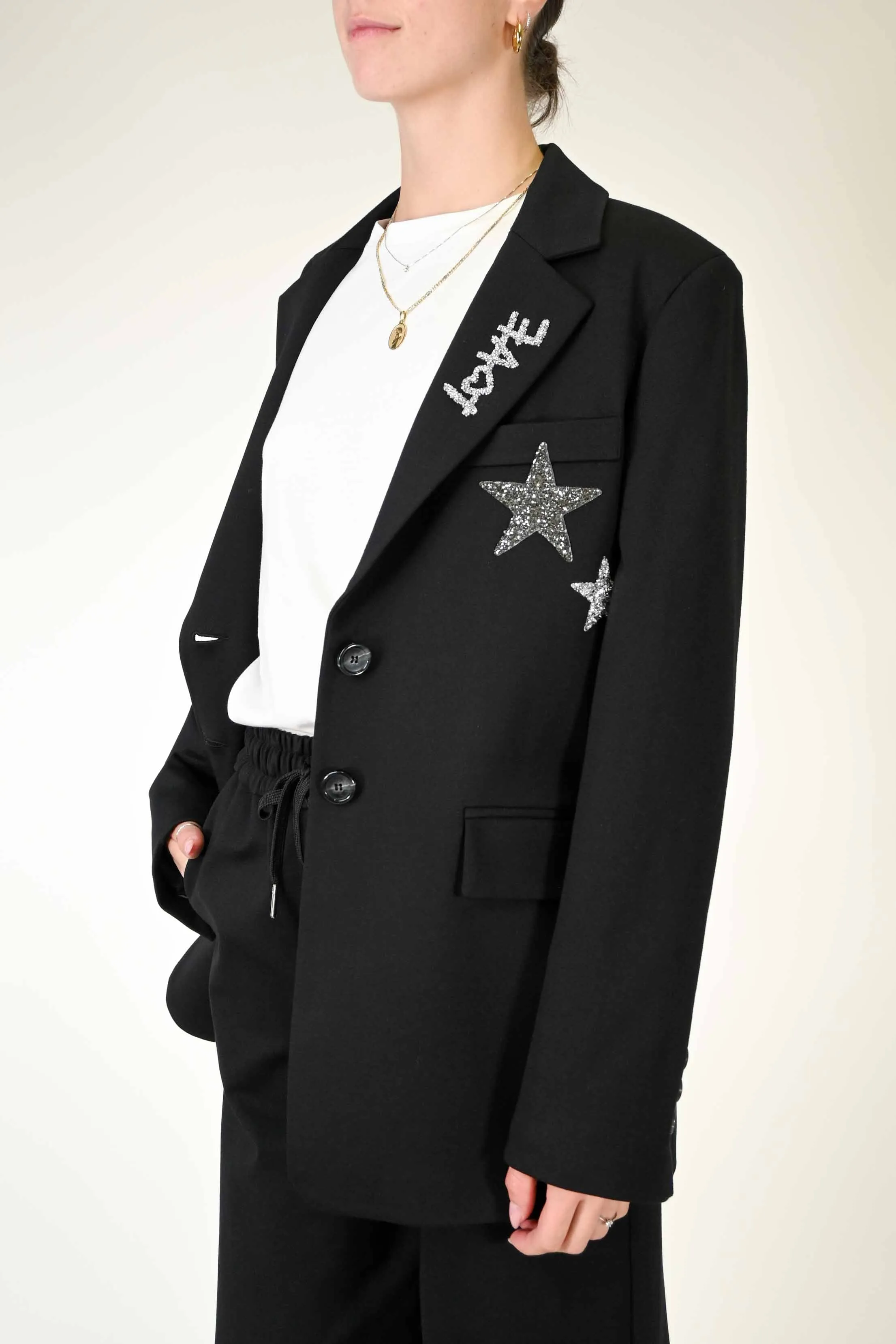 GIACCA OVER CON APPLICAZIONI STELLE/LOVE COLOR NERO