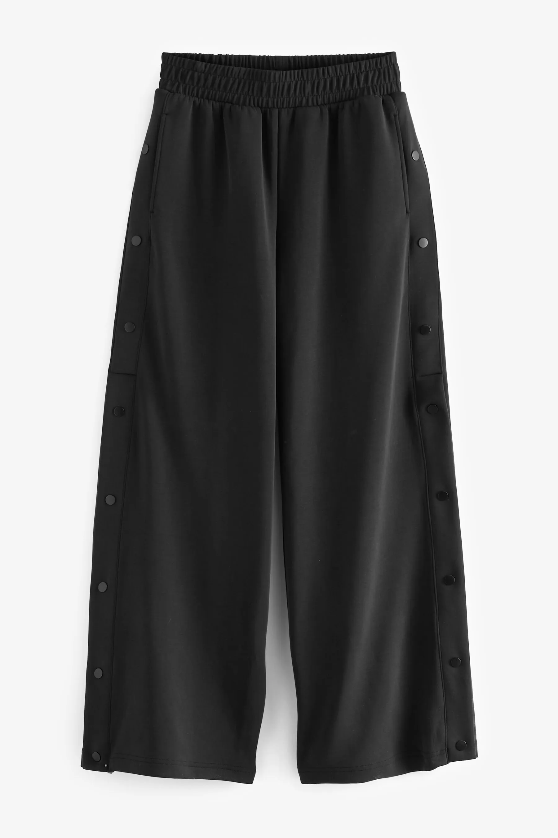 Pantaloni in morbido jersey con bottoni a bottoni laterali